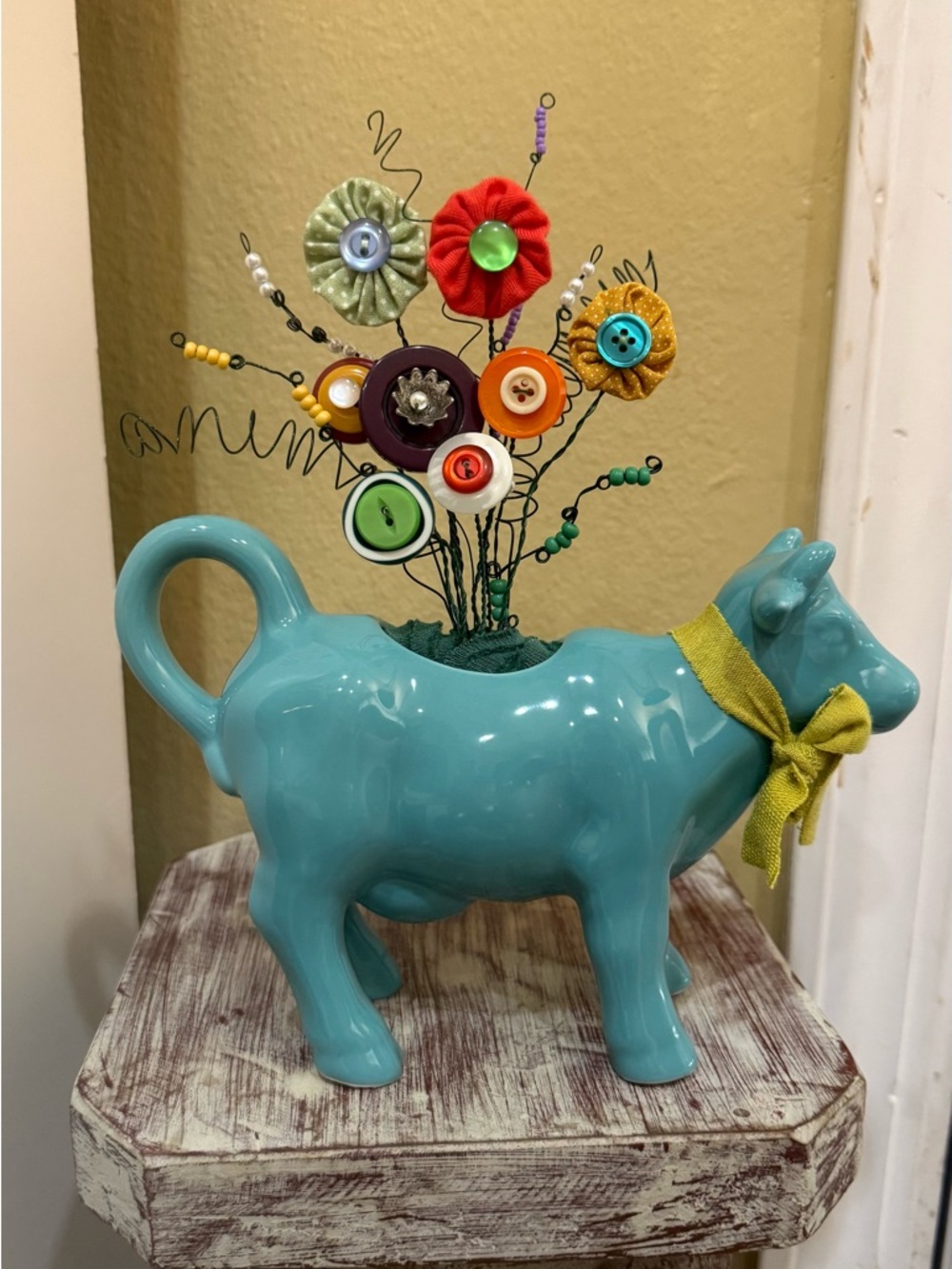 Cow flower arrangement, made with buttons, fabric yo-yo’s, beads…handmade by me.